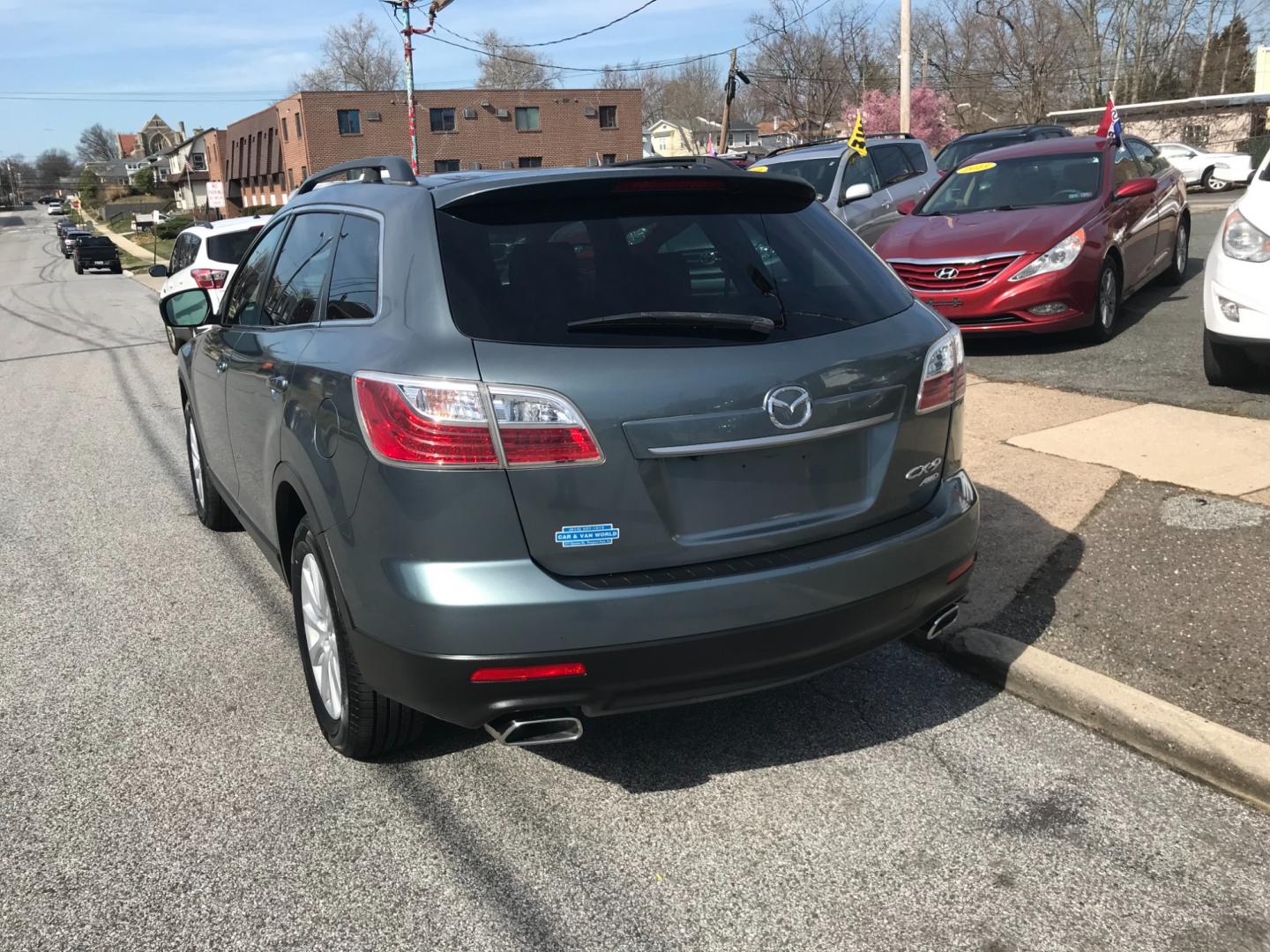 2010 Green /Black Mazda CX-9 Grand Touring (JM3TB3MV7A0) with an 3.7 V6 engine, Automatic transmission, located at 577 Chester Pike, Prospect Park, PA, 19076, (610) 237-1015, 39.886154, -75.302338 - Photo#5